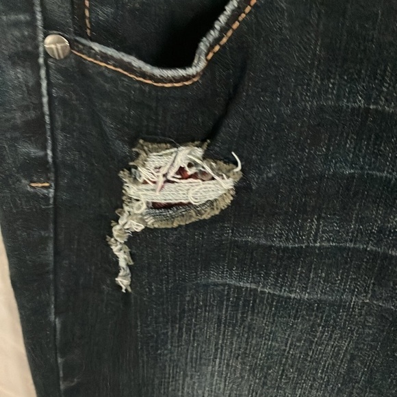 Tractr: Stretchy Skinny Jeans with red flannel covered holes- 30 - Picture 4 of 16